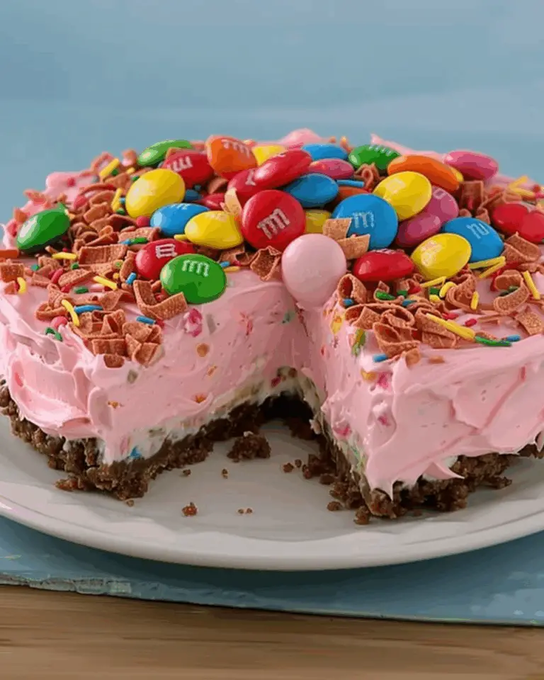 Pink M&M Snickers Cheesecake