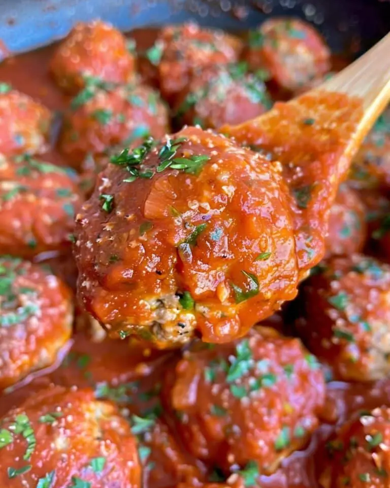 Mozzarella Stuffed Meatballs in Homemade Tomato Sauce