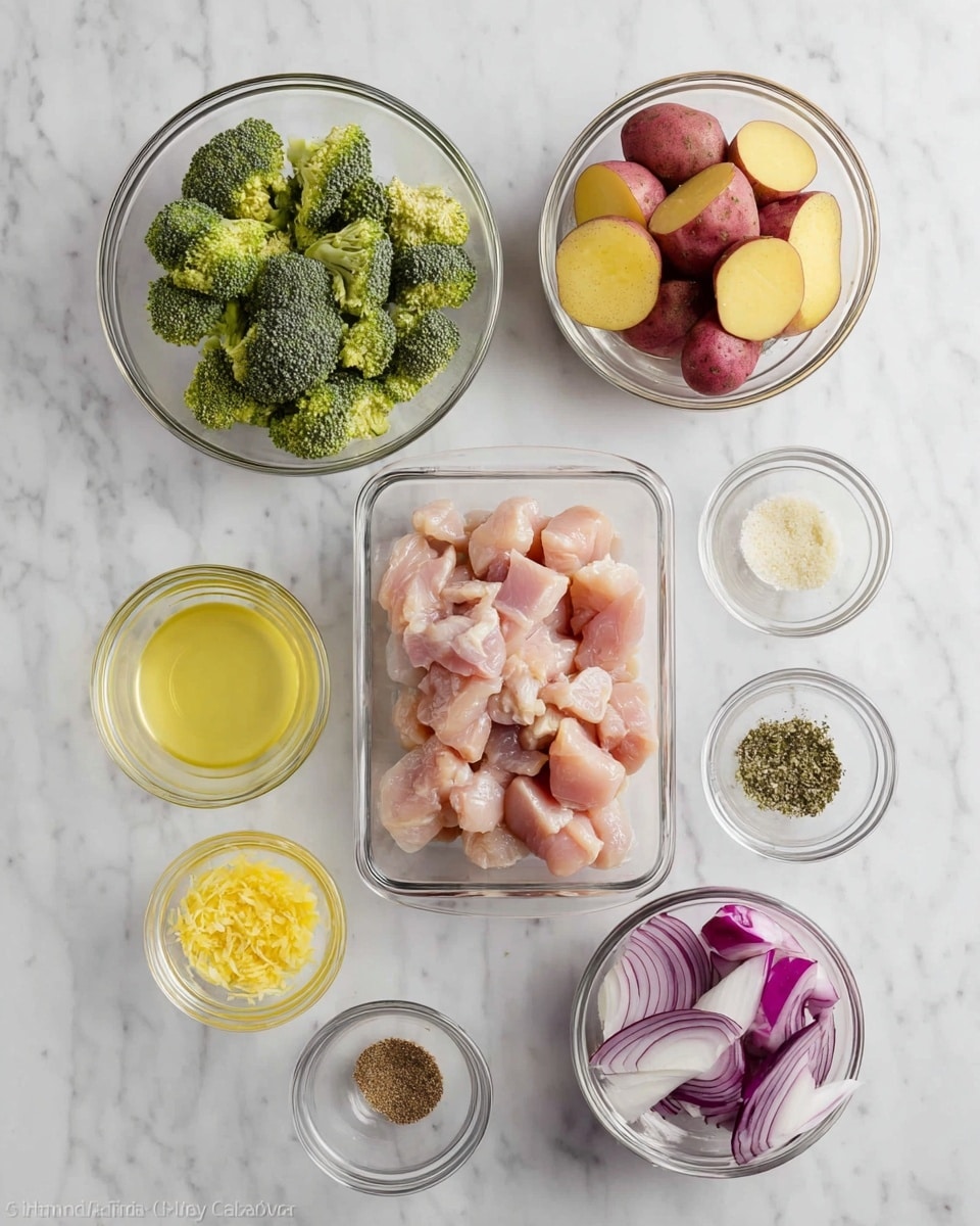 The image shows nine clear glass bowls arranged on a white marbled surface. At the center bottom is a rectangular glass bowl filled with chunks of raw chicken, pinkish in color. Above it to the left is a round bowl with bright green broccoli florets. To the right of the chicken is a bigger round bowl with halved small red potatoes showing a creamy yellow inside. Below and right of the potatoes is a small round bowl with yellow lemon zest, and next to it is another round bowl with light yellow lemon juice. Above the lemon zest and juice is a tiny bowl with minced garlic. To the left of the chicken is a bowl with pale yellow olive oil. Below that are three small bowls in a vertical line: dried herbs, salt and black pepper, and a light brown powder, and at the far bottom right is a bowl with big pieces of purple and white onion. The bright colors and textures clearly stand out against the clean white marbled surface. photo taken with an iphone --ar 4:5 --v 7