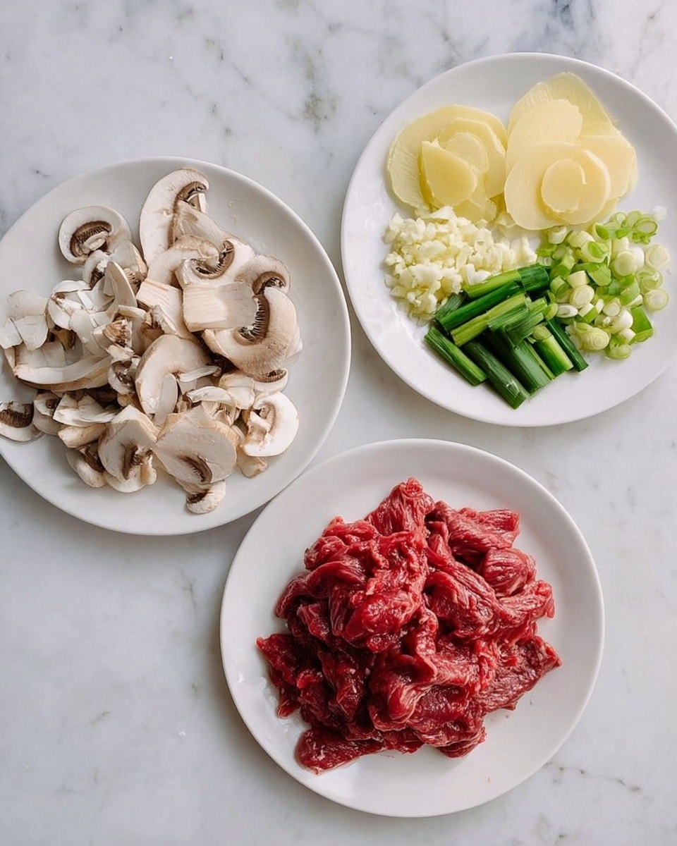 Three white plates sit on a white marbled surface. The top right plate holds four separate piles: thin round slices of pale yellow ginger, bright green chopped scallions, light green and white sliced green onions, and a small pile of finely chopped pale yellow garlic. The left plate is filled with layers of thinly sliced mushrooms, pale beige with brown centers. The bottom plate features a mound of raw red beef strips, shiny and textured. Photo taken with an iphone --ar 4:5 --v 7