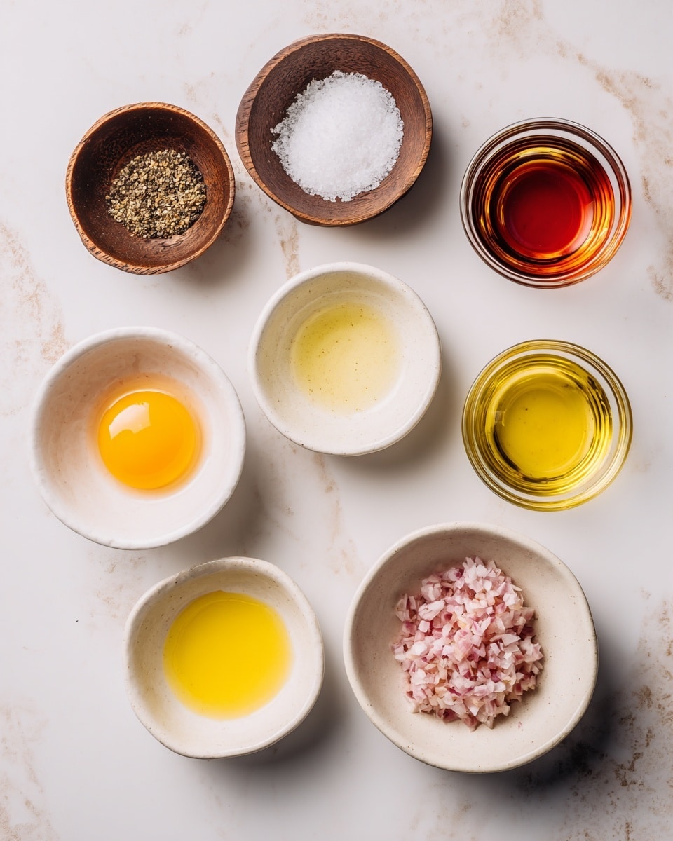 A collection of seven small white bowls arranged on a white marbled surface, each containing different ingredients. In the top row, two small brown wooden bowls hold ground pepper and coarse salt. Below them are a white bowl with a golden yellow egg yolk and a clear glass bowl with a pale yellow liquid. To the right, a transparent glass bowl contains a reddish liquid. Below these, there are three white bowls: one with olive oil, one with a dollop of yellow mustard, and one filled with finely chopped light pink shallots. The scene is evenly lit, highlighting the colors and textures of each ingredient clearly. photo taken with an iphone --ar 4:5 --v 7