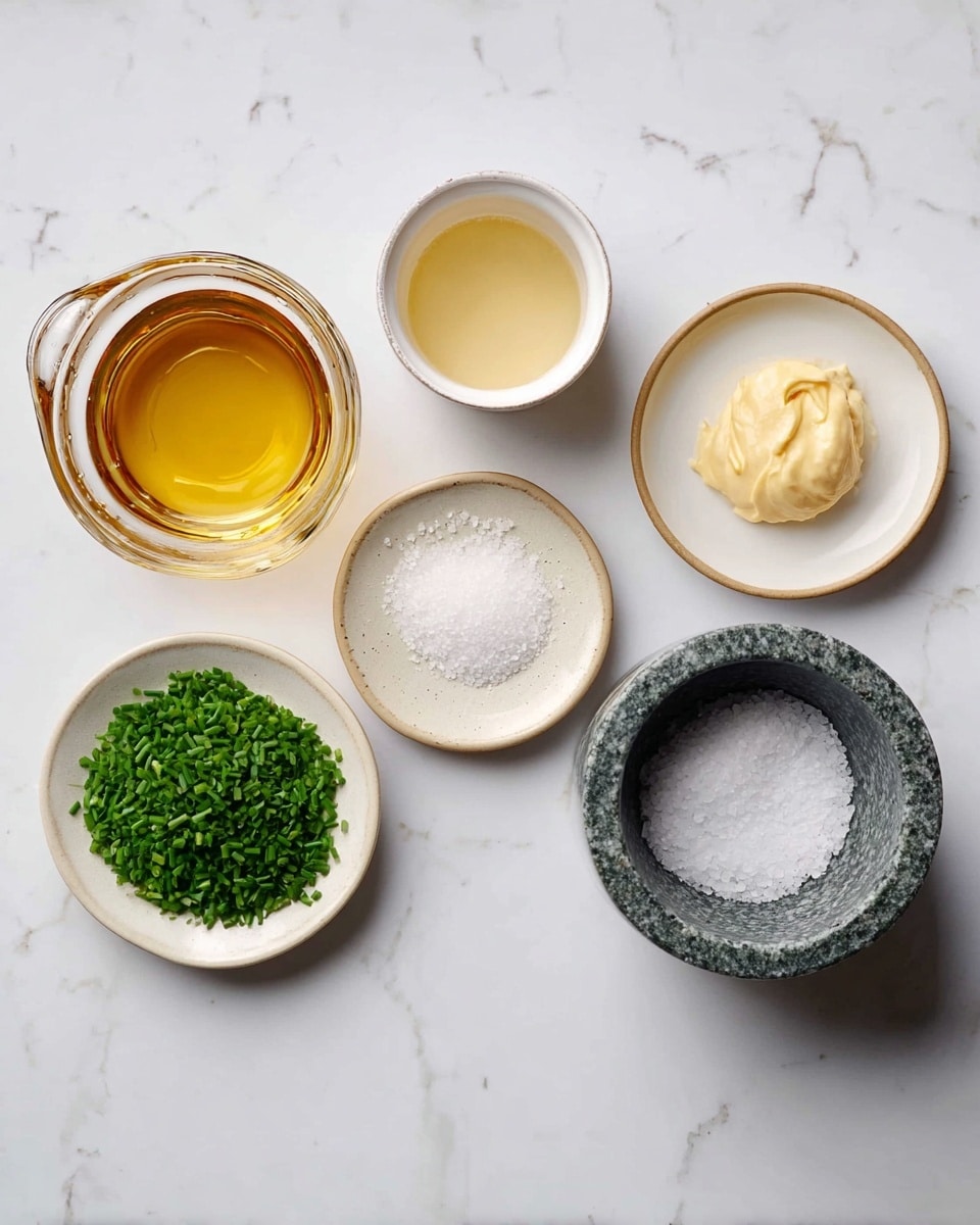 The image shows six small dishes and a glass measuring cup with different ingredients placed on a white marbled surface. Starting from left to right, the glass cup is filled with a clear golden liquid. Above it, a small white bowl contains a pale yellow, slightly thick liquid. In the center, a small light brown plate with granulated white sugar is placed. Above this, a small white bowl holds a dollop of smooth pale yellow mustard. Next to it on the right, a white plate is filled with chopped bright green herbs, likely chives. The last container on the far right is a dark gray marble mortar bowl with coarse white salt inside. The arrangement is neat, with each item clearly visible in a clean setting. Photo taken with an iphone --ar 4:5 --v 7