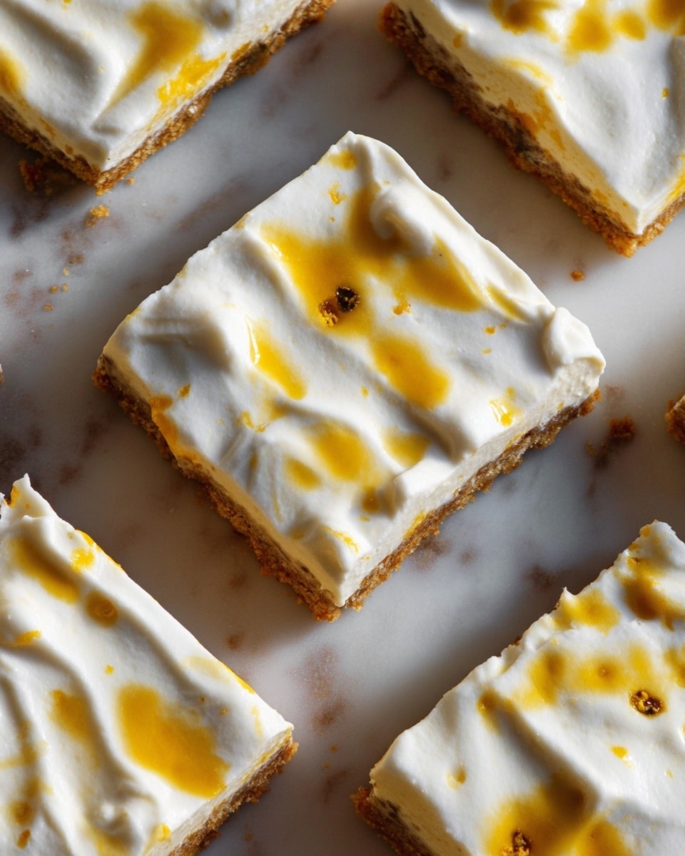 The image shows square dessert bars arranged on a white marbled surface, each with two visible layers. The bottom layer is light brown with a slightly rough texture, suggesting a baked crust. The top layer is thick, creamy white frosting that looks smooth but slightly swirled with some peaks. Over the frosting, there are bright golden-yellow streaks and spots, unevenly spread across the surface, adding a shiny contrast. The edges of the bars are neat but uneven in shape. Photo taken with an iphone --ar 4:5 --v 7