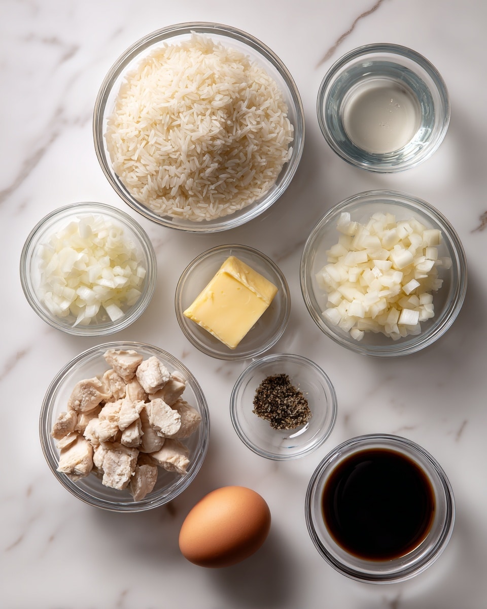 The image shows eight clear glass bowls placed on a white marbled surface, each filled with different cooking ingredients. The largest bowl contains cooked white rice with grains slightly separated, placed at the top left. To its right is a bowl holding small amounts of clear liquid and a separate empty bowl. Below these is a bowl with chopped white onion pieces. To the right of the onions are two small bowls, one with a yellow square chunk of butter and the other filled with black pepper. On the bottom left, a bowl holds diced cooked chicken pieces in off-white and light beige tones. Next to it is a small bowl with a single whole brown egg, and finally, a bowl of dark soy sauce sits near the bottom right. All bowls are neatly arranged in a loose rectangular layout. Photo taken with an iphone --ar 4:5 --v 7
