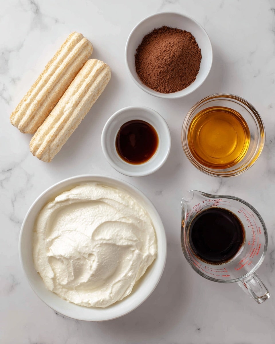 The image shows the ingredients for a dessert set on a white marbled surface. In the center, there is a white bowl filled with smooth, creamy Greek yogurt, which has a soft white texture. Above to the left, there is a small white bowl with a light brown powder of cocoa. To the right of the cocoa, there is a clear glass bowl filled with golden amber maple syrup. Next to that, another small white bowl holds dark vanilla extract with a thin liquid texture. Below the vanilla, a clear glass measuring cup contains dark espresso coffee. On the far left, a pack of lady fingers is placed horizontally, showing their light golden brown color and firm texture inside clear plastic wrapping. All items are neatly arranged with good spacing between them, and the background is a clean white marbled texture. Photo taken with an iphone --ar 4:5 --v 7
